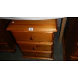 A pine 3 drawer bedside chest.