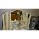 A triple dressing table mirror.