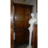 A mahogany glazed top book case.