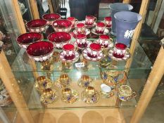 A Bohemian red glass coffee set,