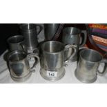 7 assorted tankards.