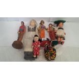 A collection of early/mid 20th century world dolls.