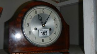 A mantel clock.