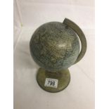 A 1950's tinplate Chad Valley globe.