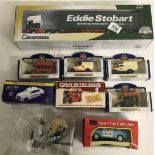 A collection of die-cast boxed including Eddie Stobart.