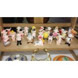 A collection of 25 piggies figurines.