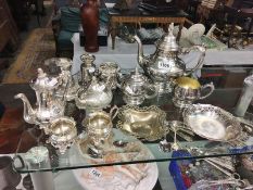 A collection of silver plate including tea/coffee sets.