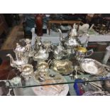 A collection of silver plate including tea/coffee sets.