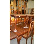 A draw leaf table and 5 chairs.