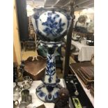A blue and white jardiniere on stand, a/f.