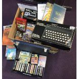 A ZX Spectrum 48k with accessories and games.