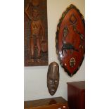 An African shield, plaque, wall mask and 2 spears.