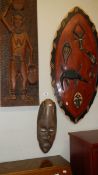 An African shield, plaque, wall mask and 2 spears.