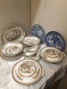 A quantity of Ironstone Indian tree pattern dinnerware and 2 blue and white plates.