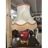 A pottery table lamp.