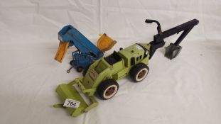 A Tonka trencher and a Dinky elevator loader (both playworn).