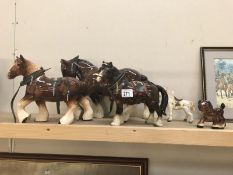 5 pottery horses.