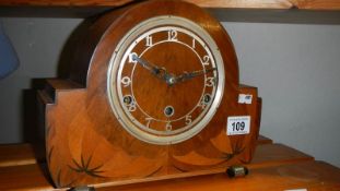 A mantel clock.