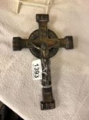 A brass crucifix.