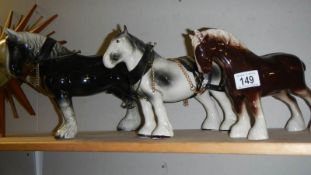 3 pottery horses.