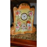 A ceramic mantel clock.