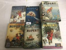 18 Rupert annuals 1950's/1960's.