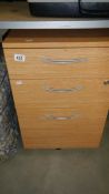 A 3 drawer bedside chest of drawers.