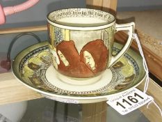 A Royal Doulton child's cup and saucer (a/f).