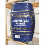 A blue pottery sherry barrel.