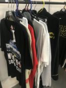 A quantity of XXL t-shirts and clothes (all as new) including Ghostbusters, Superman etc.
