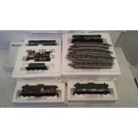 A Hawthorne village train set of Thomas Kinkades Christmas express consisting of steam engine,