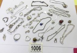 A quantity of silver pendants, bracelets etc.