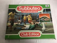 A boxed Subbuteo Club Edition football game.
