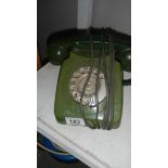 A vintage dial telephone.