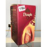 A boxed Dimple Fine Old Original 15yr blended Scotch whisky.