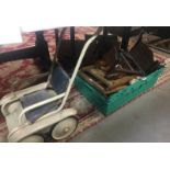 A Triangtois dolls bed 3 other doll beds, a sunsprung dolls push-chair,