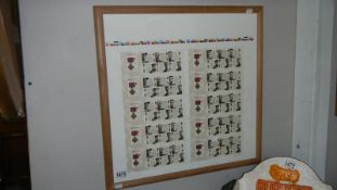 A framed and Glazed Royal Mail Victoria cross commemorative stamps press sheet with embossment.