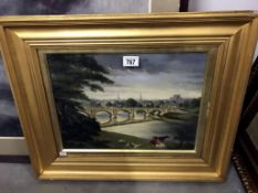 A 19th century oil painting in gilt frame '5 arched bridge across a river with twin church spires