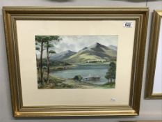 A framed & glazed watercolour 'lake scene with ferry terminal' signed W. Gillies Buchanan.