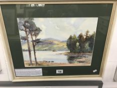 A framed & glazed watercolour 'Scottish Loch inlet' signed by John Kidd Maxton 1878 - 1942.