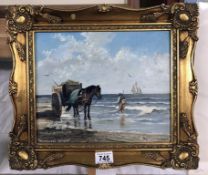 An original oil on board 'The seaweed gatherer' signed by Frederick Tordoff.