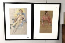 A pair of framed & glazed pastel life studies signed by M.Donnington.