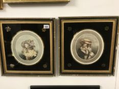 A pair of framed & glazed aquatint print portraits, pencil signed E.