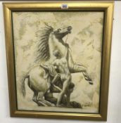 A gilt framed oil on canvas 'rearing horse' signed A. Wood.