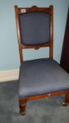 A childs bedroom chair on casters