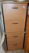 A pair of 2 drawer filing cabinets