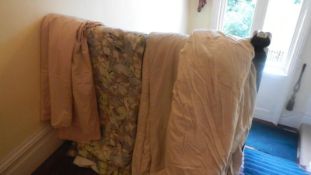 A quantity of large curtains.