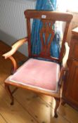 A mahogany elbow chair,