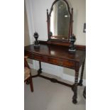 A walnut dressing table with barley twist supports