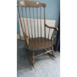 A spindle back rocking chair